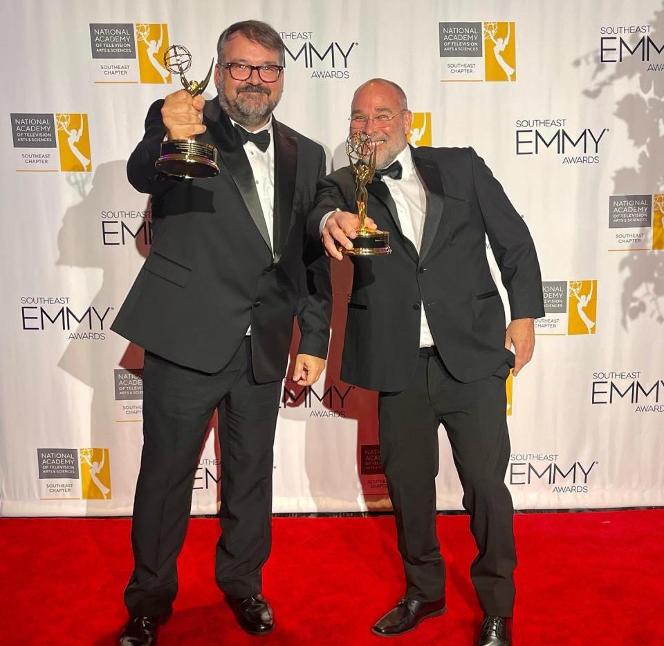 Anthony Thaxton, left, and Robert St. John show off the best historical documentary Emmy Award they won for "Walter Anderson: The Extraordinary Life and Art of The Islander."