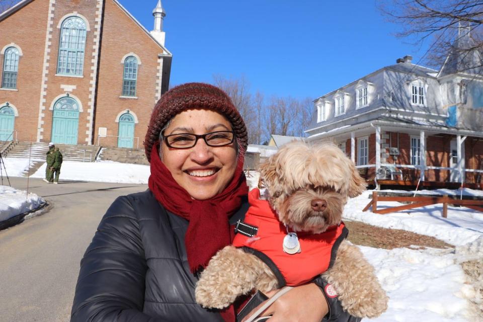 Tarun Channa pictured with her dog Tuffy. She says it's been exciting to see such activity in a small town. 