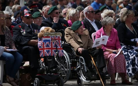 Veterans and their families in Arromanches - Credit: Jane Barlow/PA