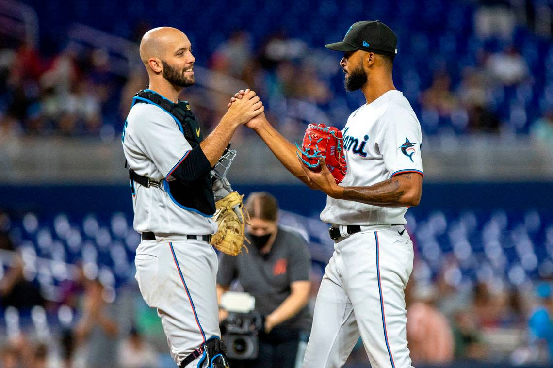 Miami Marlins pitcher Sandy Alcantara (22) reacts with catcher Jacob Stallings (58) after the Marlins defeated the Cincinnati Reds 3-0 in nine innings of an MLB game at loanDepot park in the Little Havana neighborhood of Miami, Florida, on Wednesday, August 3, 2022.
