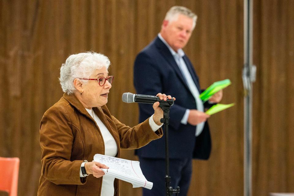 From left, Sheila Hochhauser asks for an explanation of Dr. Hugh Broomall, Deputy Superintendent at Red Clay Consolidated School District, during a parent meeting held at Marbrook Elementary School in Wilmington, Tuesday, Dec. 5, 2023. Red Clay is considering phasing out Spanish immersion instruction at the school.