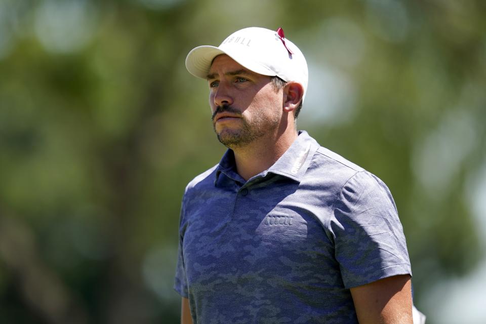 Scott Stalling watches his shot off the 17th tee during the second round of the Charles Schwab Challenge golf tournament at the Colonial Country Club, Friday, May 27, 2022, in Fort Worth, Texas. (AP Photo/LM Otero)