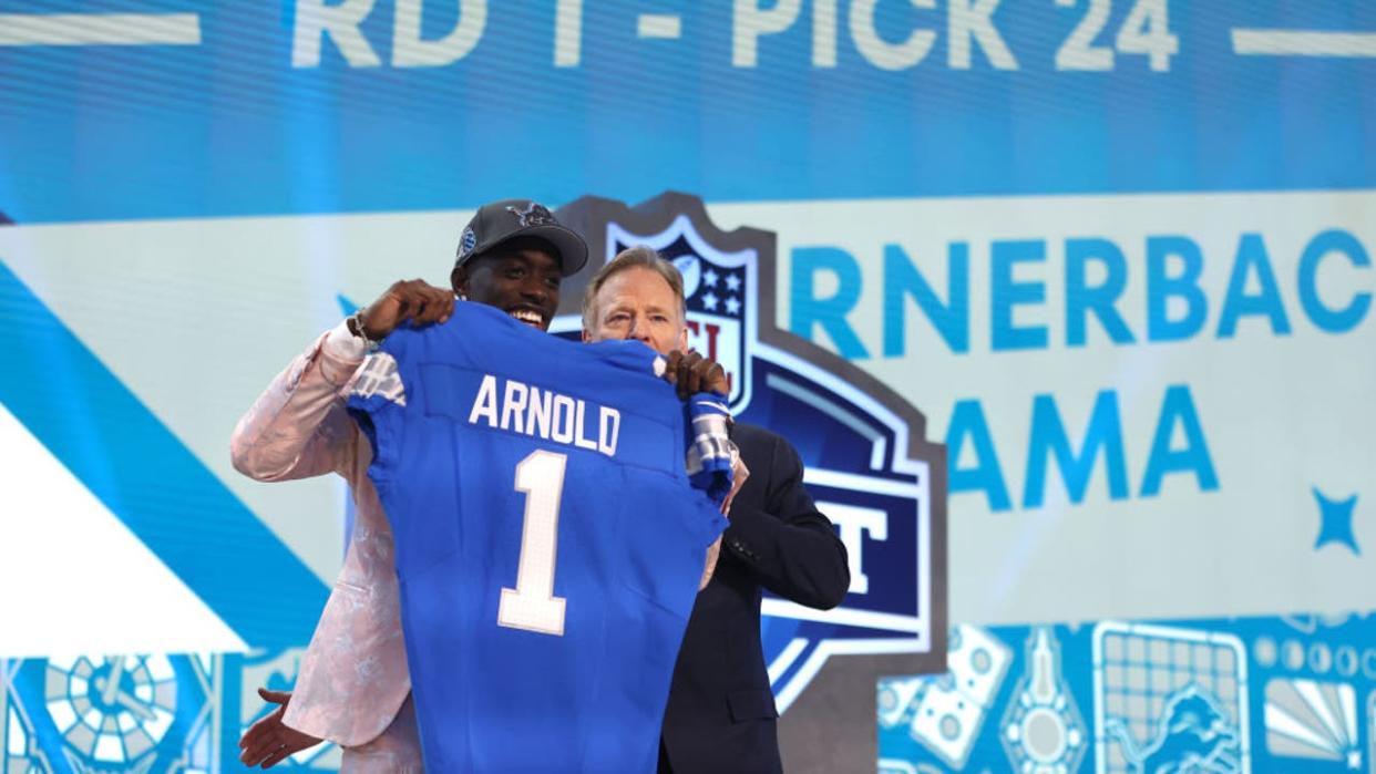 <div>DETROIT, MICHIGAN - APRIL 25: (L-R) Terrion Arnold poses with NFL Commissioner Roger Goodell after being selected 24th overall by the Detroit Lions during the first round of the 2024 NFL Draft at Campus Martius Park and Hart Plaza on April 25, 2024 in Detroit, Michigan. (Photo by Gregory Shamus/Getty Images)</div>