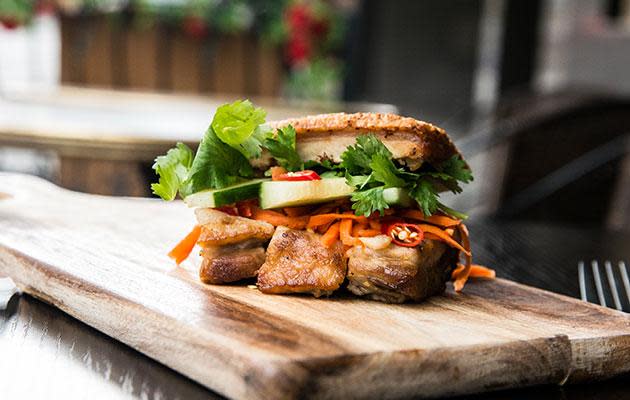 <p>The Pork Belly Bahn Mi Burger at Le Vietnam <a rel="nofollow noopener" href="https://www.instagram.com/levietnamcafe/" target="_blank" data-ylk="slk:Le Vietnam;elm:context_link;itc:0;sec:content-canvas" class="link "> Le Vietnam</a> is a mix of crispy pork belly stuffed with the bánh mì essentials' drizzled with garlic sriracha mayo. No bread involved and you can totally order this bad boy through Deliveroo so you don't even have to leave the couch.</p>