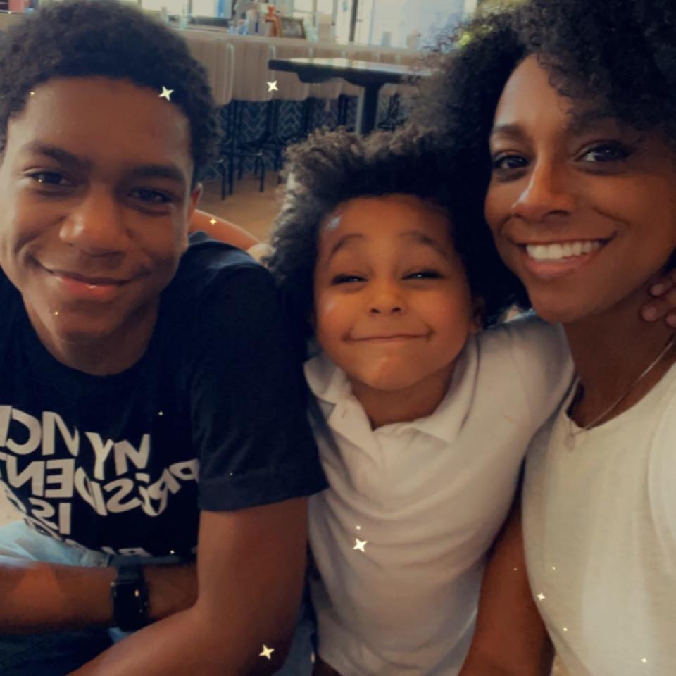 Bryce Brooks with his younger brother Christian and their mother, Crystal Brooks.
