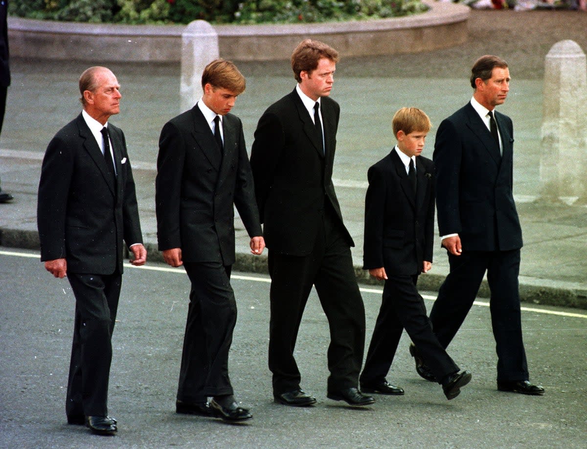 Duke of Sussex 40th birthday: <p>The then-Prince of Wales, Prince William, 12-year-old Prince Harry, Earl Spencer and the Duke of Edinburgh walking behind the coffin of Diana, Princess of Wales</p> (Adam Butler/PA)