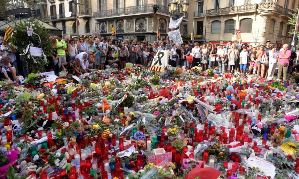 People pay tribute to those who died in the attacks on Las Ramblas in Barcelona, three days after a van ploughed into a crowd.