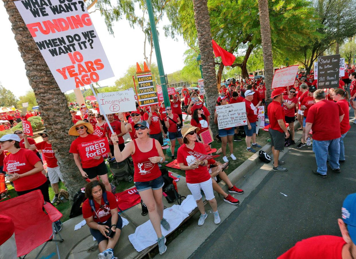 On April 27, 2018, teachers rally outside the Capitol in Phoenix, in a series of strikes across the nation over low teacher pay. (Photo: AP Photo/Matt York)