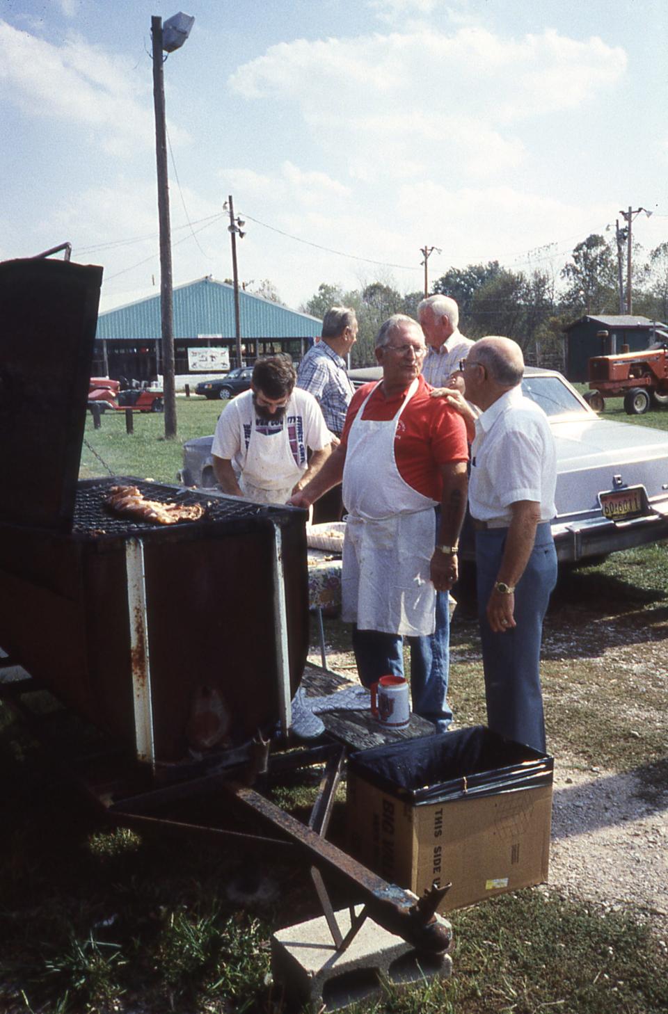 Melton works the grill at the Owen County Fairgrounds. Melton was president of the Fair Association as one time.