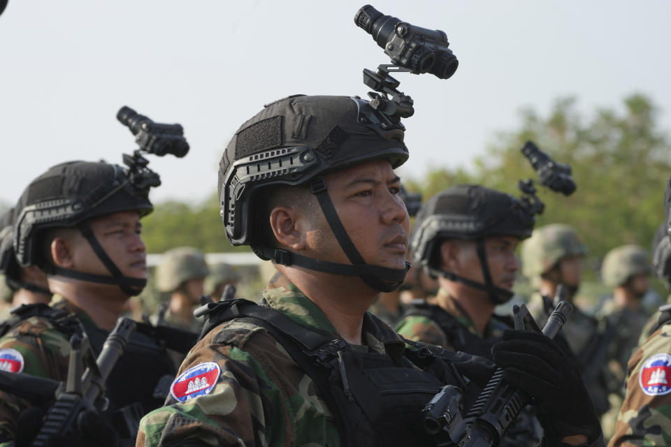 Cambodian military personnel line up during the Golden Dragon military exercise in Svay Chok village, Kampong Chhnang province, north of Phnom Penh Cambodia, Thursday, May 16, 2024. Cambodia and China on Thursday kicked off their annual Golden Dragon military exercise to strengthen cooperation and exchange military experiences. (AP Photo/Heng Sinith)