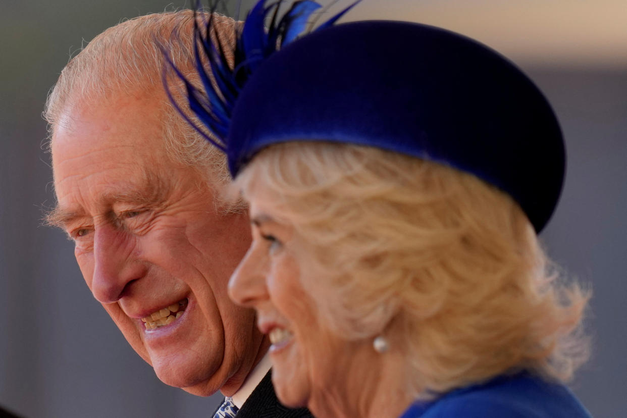 Britain's King Charles III and Camilla, the Queen Consort, smile during a Ceremonial Welcome for President of South Africa Cyril Ramaphosa at Horse Guards Parade in London, Britain Tuesday, Nov. 22, 2022. Kirsty Wigglesworth/Pool via REUTERS