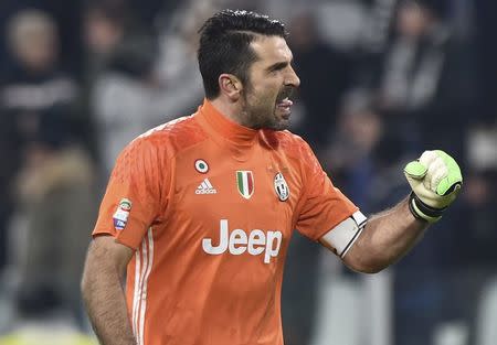 Football Soccer - Juventus v Inter Milan - Italian Serie A - Juventus stadium,Turin, Italy - 05/02/17 - Juventus' goalkeeper Gianluigi Buffon reacts following the goal scored by Juan Cuadrado against Inter Milan. REUTERS/Giorgio Perottino