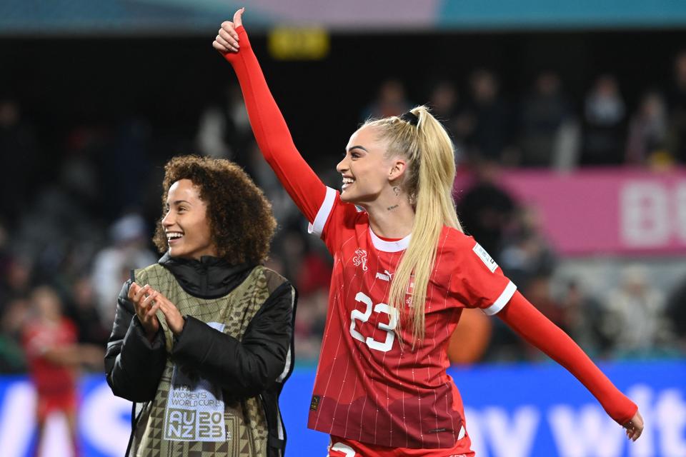 Switzerland's forward #23 Alisha Lehmann (R) greets supporters at the end of the Australia and New Zealand 2023 Women's World Cup Group A football match between Switzerland and New Zealand at Dunedin Stadium in Dunedin on July 30, 2023. (Photo by Sanka Vidanagama / AFP) (Photo by SANKA VIDANAGAMA/AFP via Getty Images)