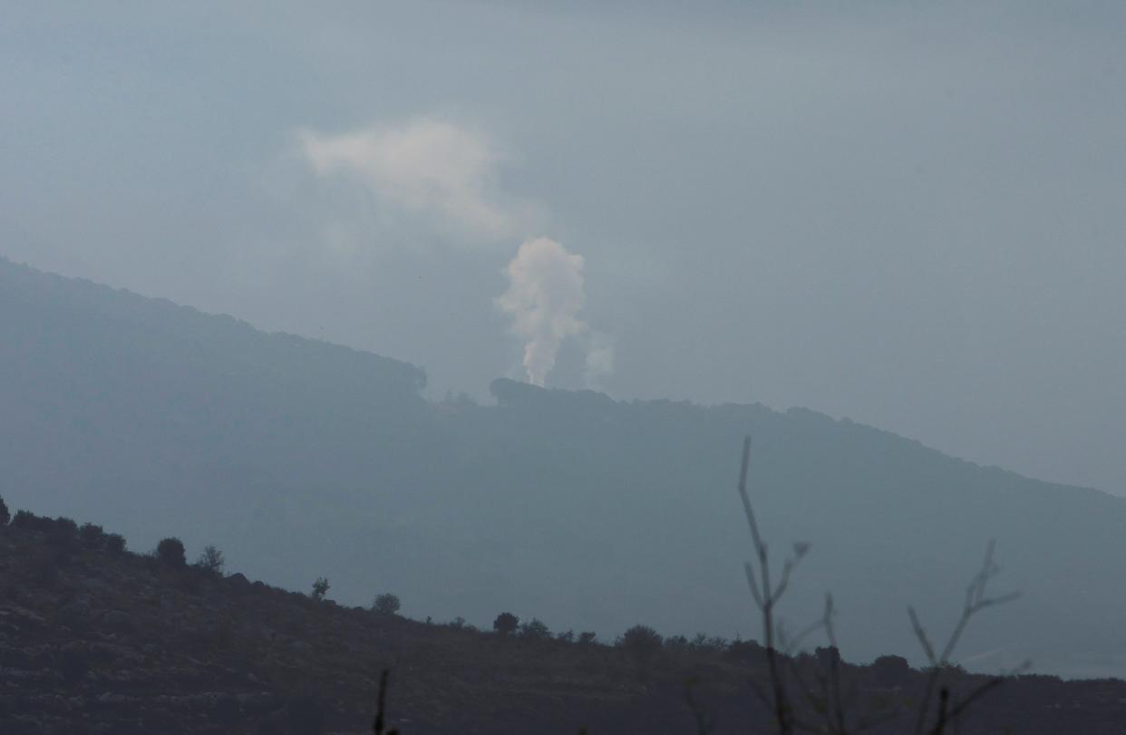 Smoke rises from Halta village as seen from Ibl al-Saqi village in southern Lebanon (REUTERS/Aziz Taher)