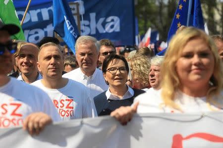 Former Prime Minister of Poland, Ewa Kopacz and Civic Platform leader Grzegorz Schetyna take part in an anti-government demonstration called "March of Freedom" organised by opposition parties in Warsaw, Poland May 6, 2017. Agencja Gazeta/Przemek Wierzchowski via REUTERS