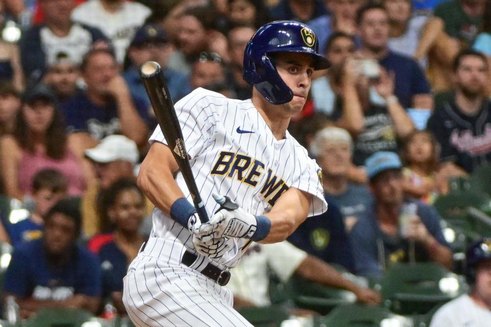 Brewers rightfielder Sal Frelick hits a single in the fifth inning against the Atlanta Braves. It was one of his three hits Saturday night.
