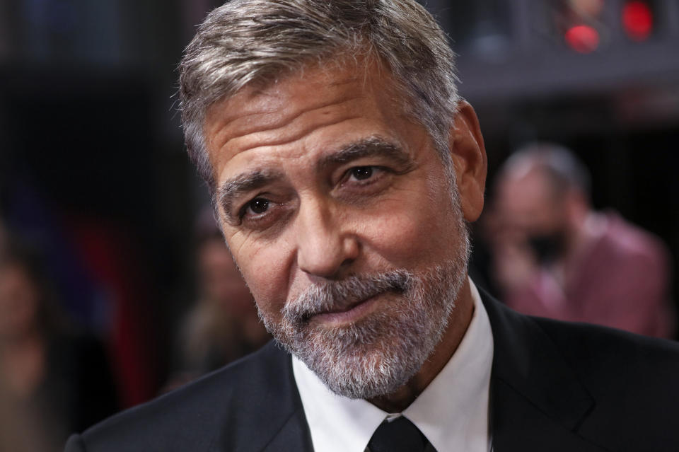 FILE - George Clooney poses for photographers upon arrival at the premiere of the film 'The Tender Bar' during the 2021 BFI London Film Festival in London, Oct. 10, 2021. (Photo by Vianney Le Caer/Invision/AP, File)