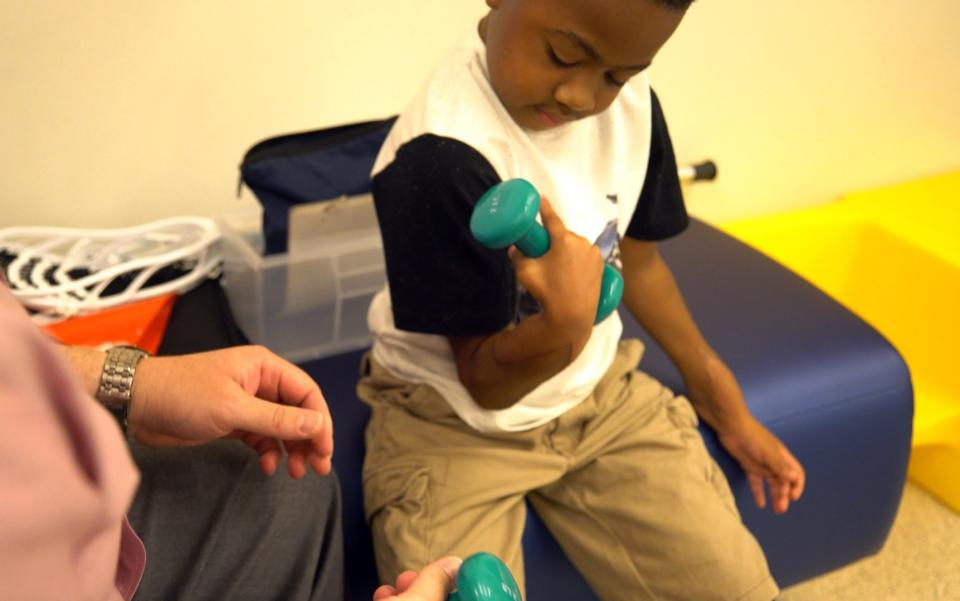 Daily therapy will help Zion Harvey to increase his hand function - Credit: Children’s Hospital of Philadelphia