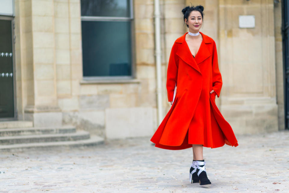 Red is catnip to street style photogs — especially when you give ’em a twirl.