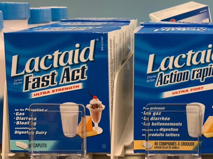 Boxes of Lactaid on shelves at store