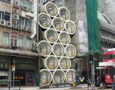 <p>En el futuro, quizá las grandes ciudades cuenten con varios edificios como estos con apartamentos en forma de tubería apilados. Se trata de un proyecto de un estudio de arquitectura de Hong Kong. (Foto: James Law Cybertecture). </p>