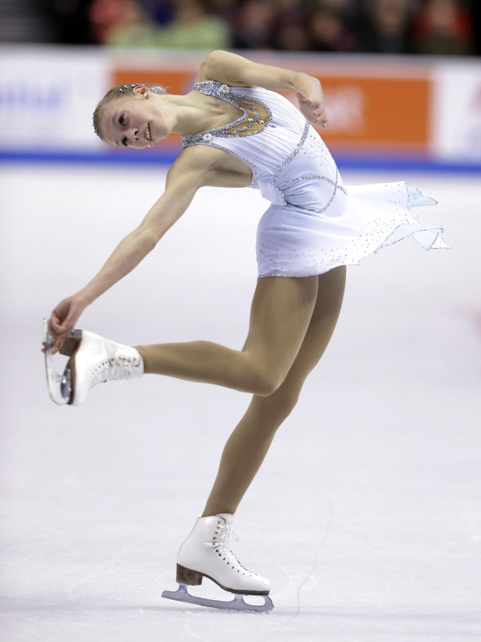 Polina Edmunds competes in the women's free skate at the U.S. Figure Skating Championships Saturday, Jan. 11, 2014 in Boston. (AP Photo/Steven Senne)