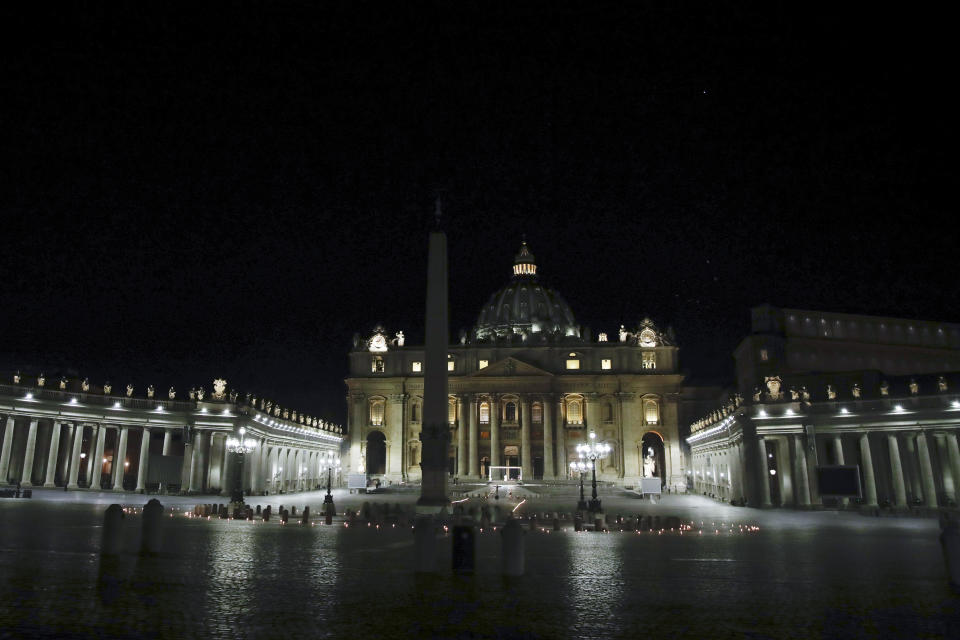 Pope Francis presides over the Via Crucis – or Way of the Cross – ceremony in St. Peter's Square empty of the faithful following Italy's ban on gatherings to contain coronavirus contagion, at the Vatican, Friday, April 10, 2020. The new coronavirus causes mild or moderate symptoms for most people, but for some, especially older adults and people with existing health problems, it can cause more severe illness or death. (AP Photo/Alessandra Tarantino)