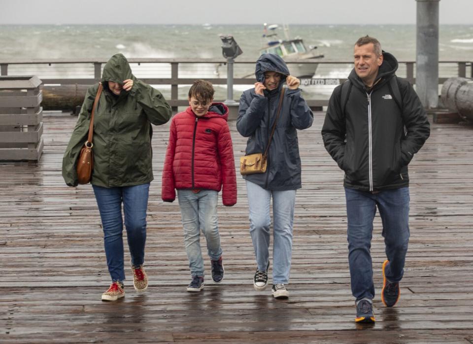 The Braham family, visiting from France, at Stearns Wharf in Santa Barbara on Friday.