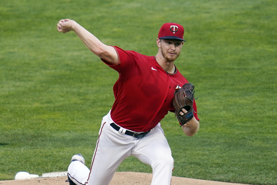 Minnesota Twins pitcher Bailey Ober throws against the Houston Astros in the first inning of a baseball game, Friday, June 11, 2021, in Minneapolis. (AP Photo/Jim Mone)