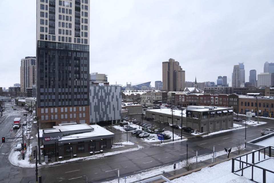 A general view of Northeast Minneapolis as snow covers parts of the city, Monday, March 25, 2024. (AP Photo/Abbie Parr)