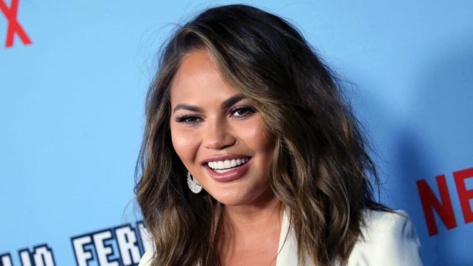 Chrissy Teigen, pregnant with her fourth child, says she can now feel her baby bump. (Photo by David Livingston/Getty Images)