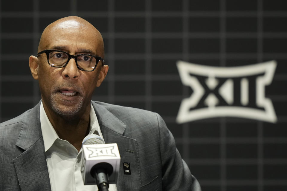 UCF coach Johnny Dawkins addresses the media during the NCAA college Big 12 men's basketball media day Wednesday, Oct. 18, 2023, in Kansas City, Mo. (AP Photo/Charlie Riedel)