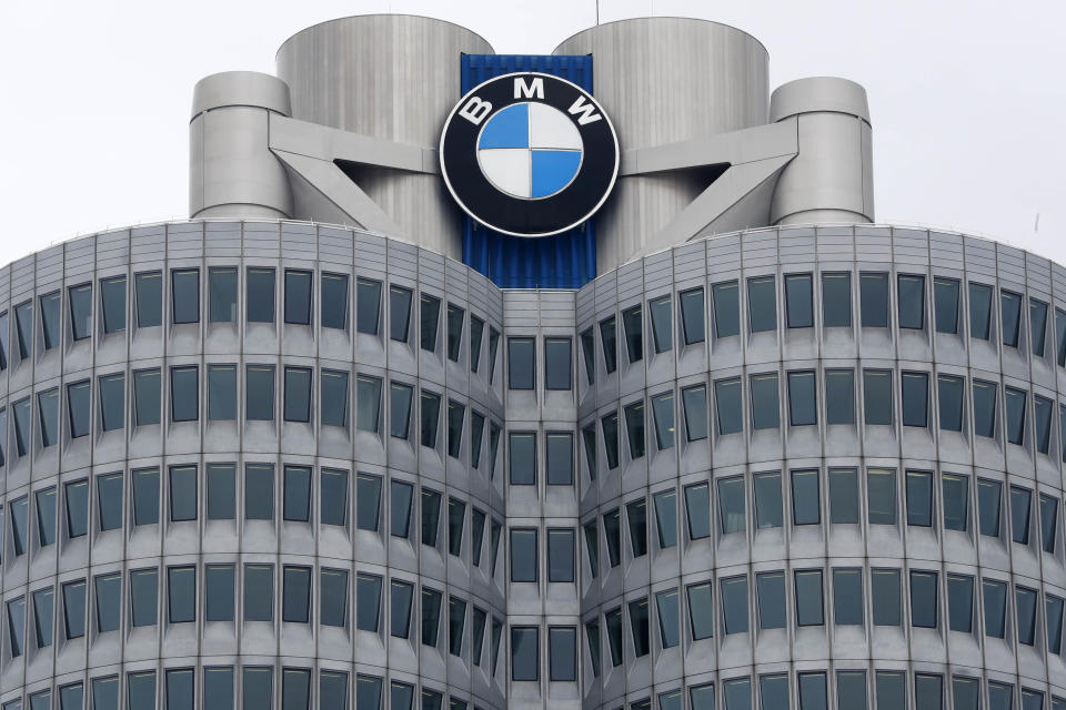 FILE - In this Wednesday, March 21, 2018 file photo, the logo of German car manufacturer BMW is pictured at the headquarters in Munich, Germany. German automaker BMW AG lost 212 million euros, $250 million, in the second quarter as the coronavirus pandemic shutdowns cut vehicle sales by a quarter in the April-June period. (AP Photo/Matthias Schrader, file)