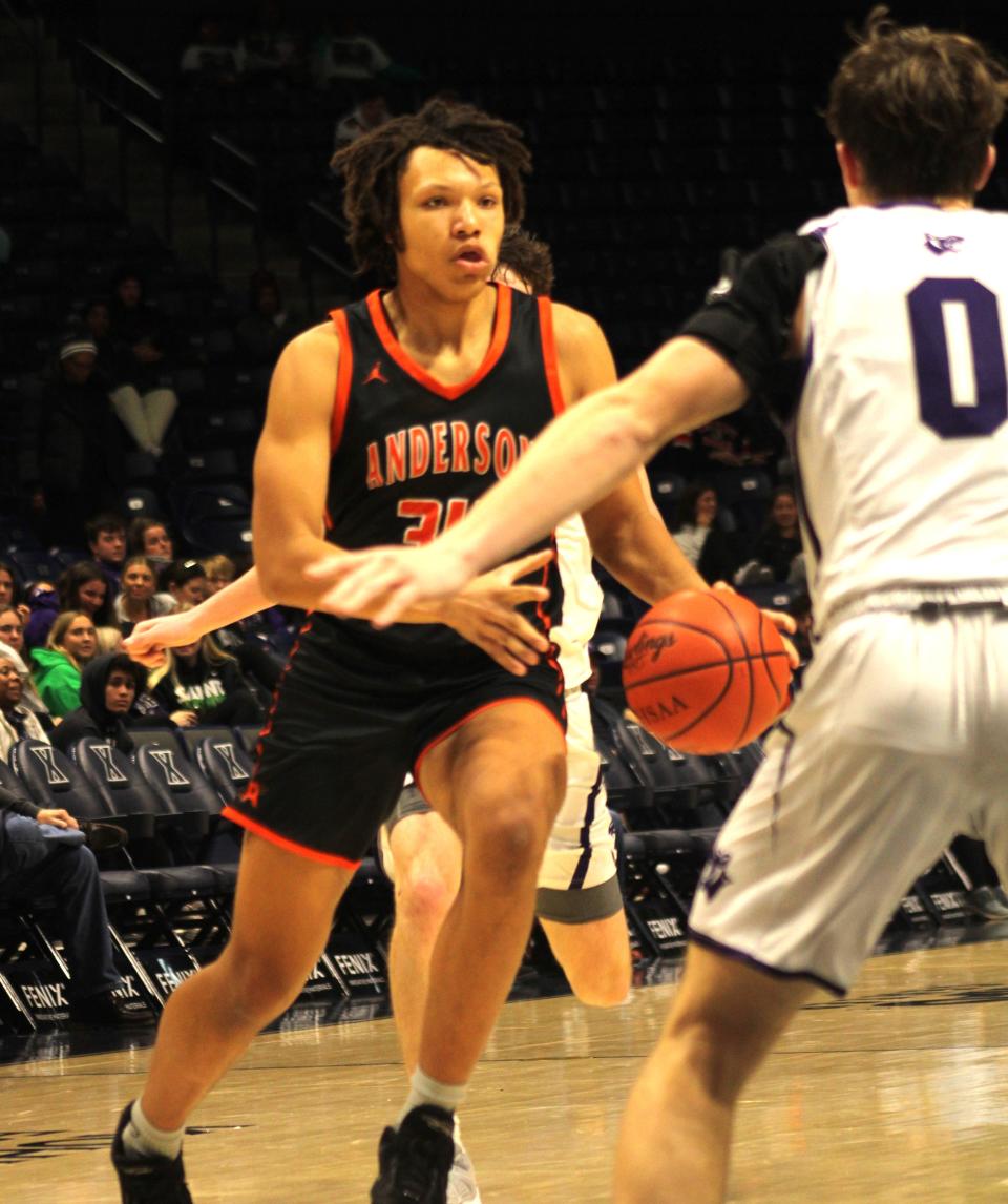 Anderson junior A.J. Austin-Robinson looks for an opening in Elder's 56-39 win during the LaRosa's Holiday Hardwood Classic at Xavier University's Cintas Center on Dec. 28, 2023.