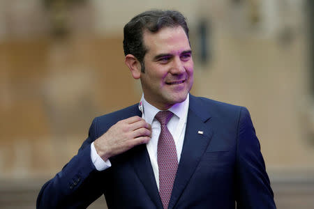 President of the National Electoral Institute (INE) Lorenzo Cordova gestures during his arrival at Palacio de Mineria before the first presidential debate in Mexico City, Mexico April 22, 2018. REUTERS/Henry Romero