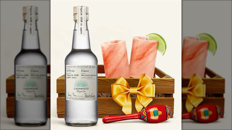 Wooden crate with Himalayan salt shot glasses and Casamigos Tequila Blanco