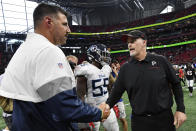 Atlanta Falcons head coach Dan Quinn, right, speaks with Tennessee Titans head coach Mike Vrabel after an NFL football game, Sunday, Sept. 29, 2019, in Atlanta. The Tennessee Titans won 24-10. (AP Photo/John Amis)