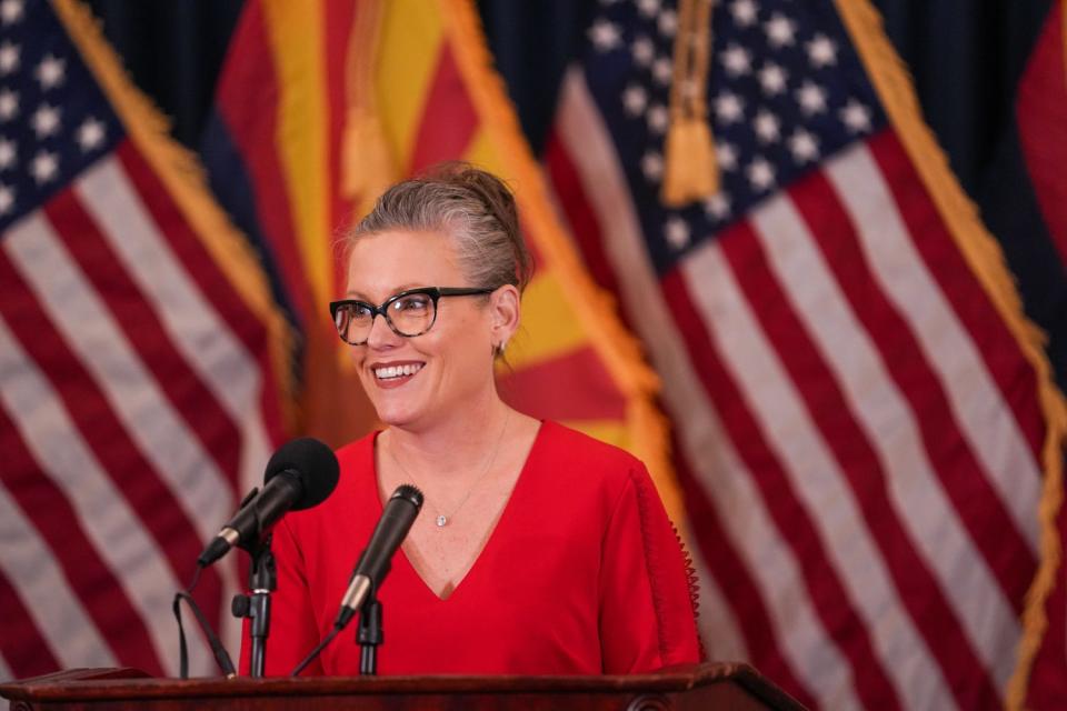 Gov. Katie Hobbs answers questions during a press conference at the Arizona State Capitol on Friday, Jan. 20, 2023, in Phoenix.