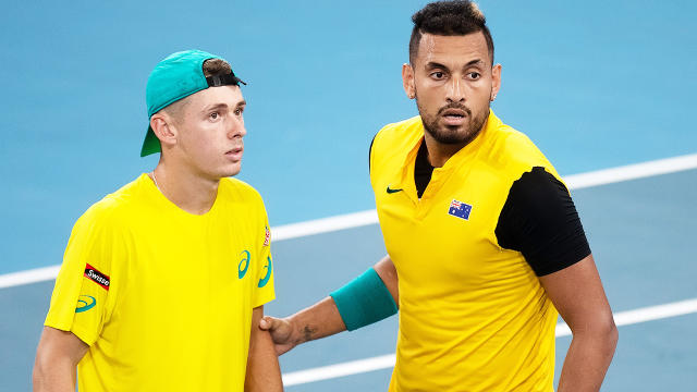 Alex De Minaur (pictured left) talking with Nick Kyrgios (pictured right) during Davis Cup doubles.