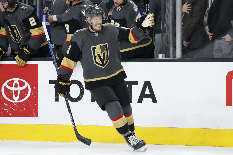 Vegas Golden Knights center Nick Cousins (21) celebrates after scoring against the Edmonton Oilers during the third period of an NHL hockey game Wednesday, Feb. 26, 2020, in Las Vegas. (AP Photo/John Locher)