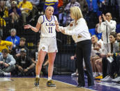 LSU guard Hailey Van Lith (11) talks with coach Kim Mulkey during the first half of the team's NCAA college basketball game against Texas A&M on Thursday, Jan. 11, 2024, in Baton Rouge, La. (Michael Johnson/The Advocate via AP)