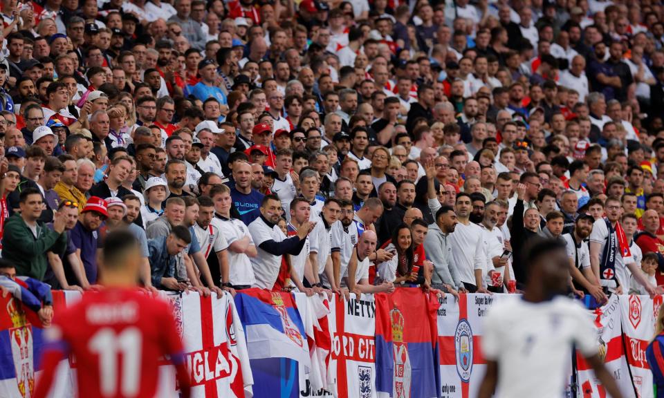 <span>England fans at the Arena AufSchalke for the 1-0 Group C win against Serbia.</span><span>Photograph: Tom Jenkins/The Guardian</span>