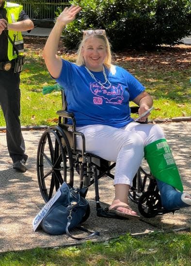 Cindy Banyai, a Southwest Florida candidate for the U.S. House of Representatives, faces charges in a Thursday protest against the U.S. Supreme Court's decision overturning the landmark abortion rights case Roe V. Wade.