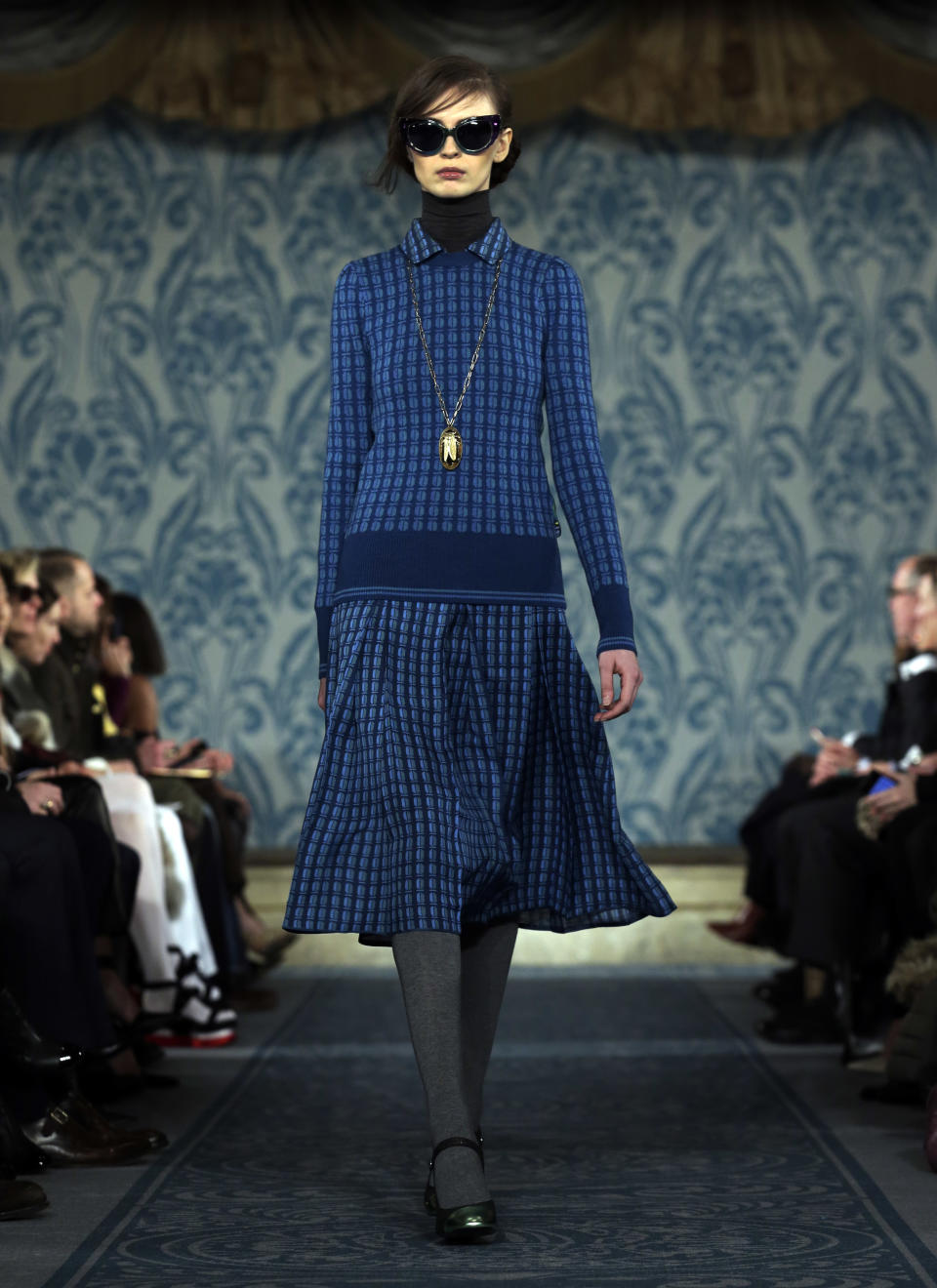 The Tory Burch Fall 2013 collection is modeled during Fashion Week in New York, Tuesday, Feb. 12, 2013. (AP Photo/Richard Drew)