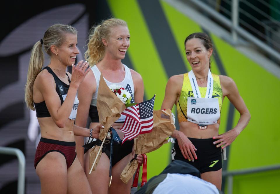 Karissa Schweizer, left, Alicia Monson and Natosha Rogers gather after their finish in the women’s 10,000 meters at Prefontaine Classic Friday, May 27, 2022. 