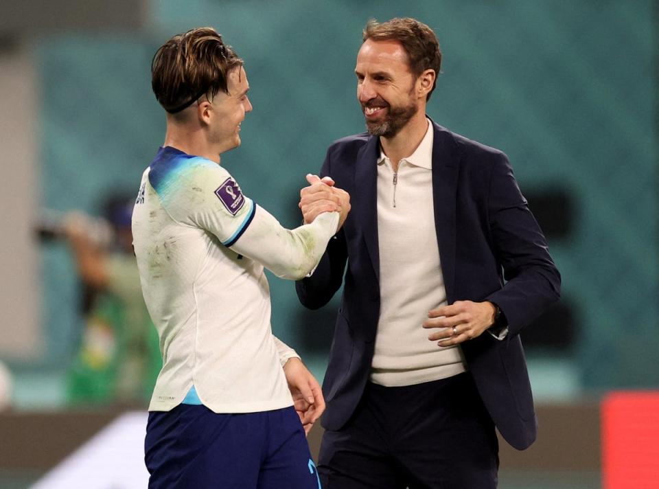 Grealish shakes hands with Gareth Southgate after the match (Reuters)