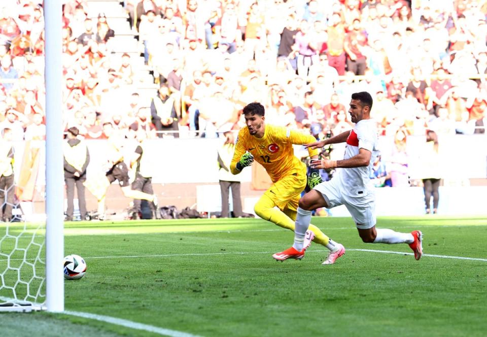 Samey Akaydin scores an own goal with a blind pass. (REUTERS)