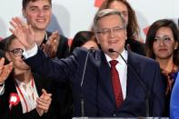 Polish President Bronislaw Komorowski reacts after the announcement of the exit poll results of the second round of the presidential election in Warsaw, on May 24, 2015