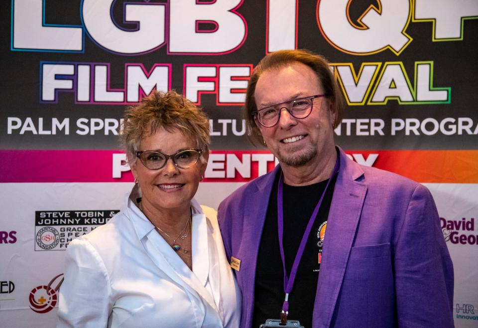 Actor Amanda Bearse poses for a photo with Michael Green, executive director of the Palm Springs Cultural Center, during Cinema Diverse at the Palm Springs Cultural Center in Palm Springs, Calif., Thursday, Sept. 15, 2022. 