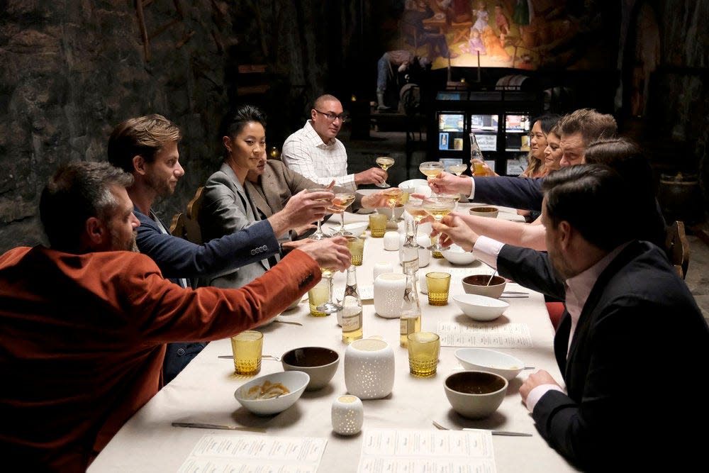 "Top Chef: Wisconsin" Episode 3 judges Luke Zahm (clockwise from left), Charlie Berens, Kristen Kish, Tom Colicchio, Omar Shaikh, Jamie Brown-Soukaseume, Gail Simmons, Joe Flamm, Carol Walker and Kyle Knall raise a glass of Miller High Life inside the Historic Miller Caves.